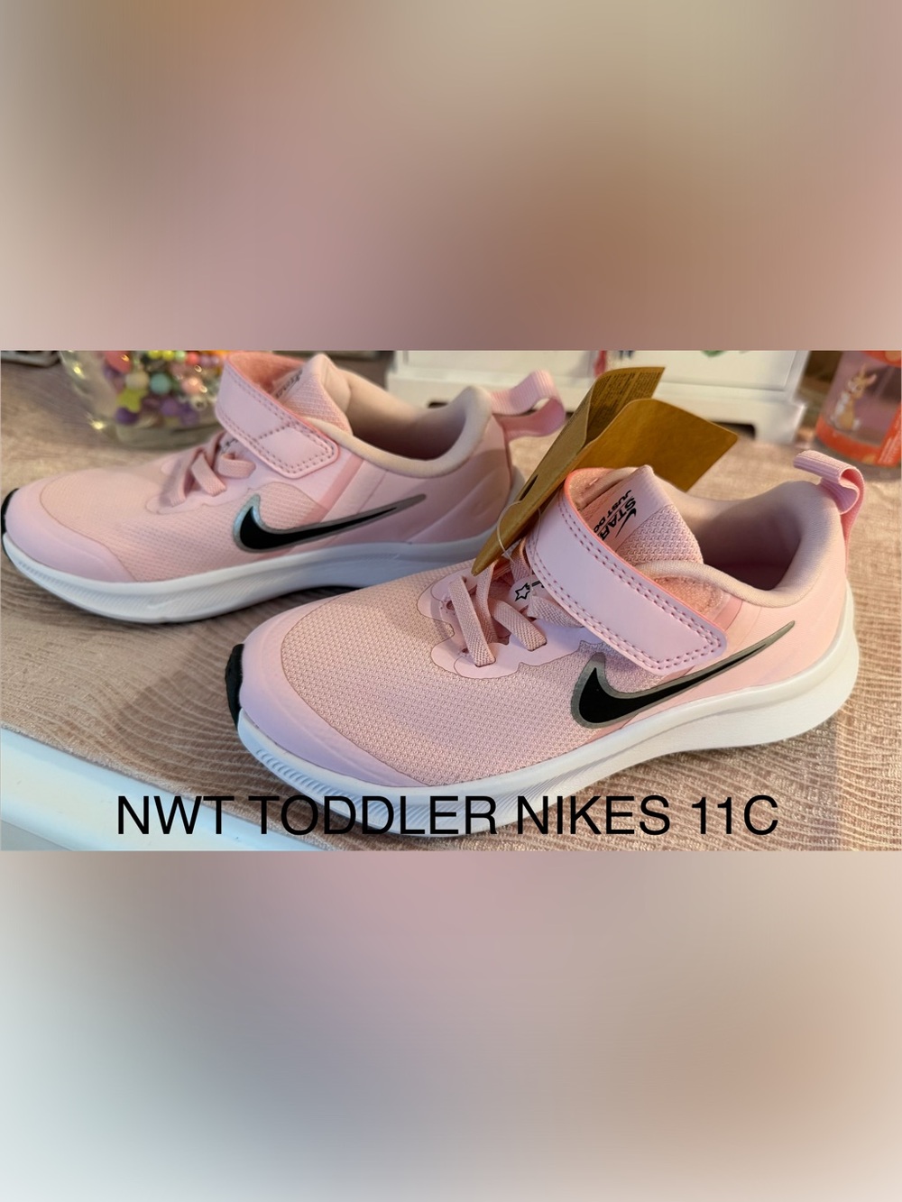 Nike Toddler Pink Sneakers with Black Swoosh